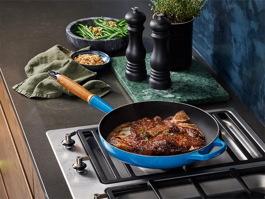 T-bone con burro all’aglio nero e fagiolini